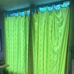 Chartreuse green velour drapes with aqua blue trim and accents